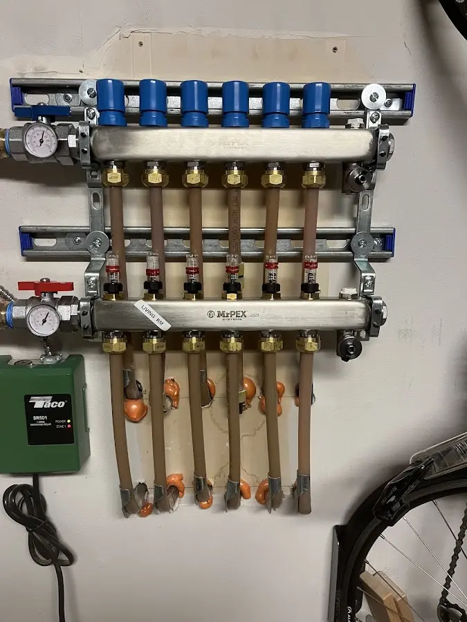 Plumber performing Leak Detection at a residential property in Lansing