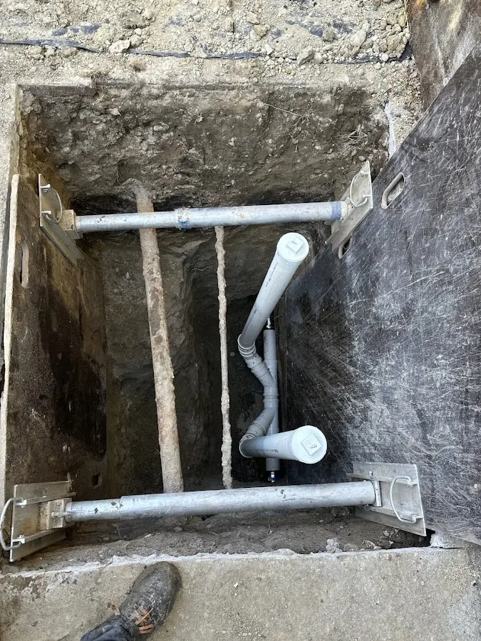 Experienced plumber completing Drain Cleaning work in Lansing